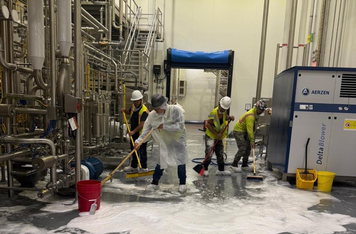 JC Legacy crew working on a live food and beverage plant floor